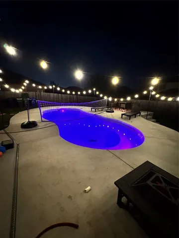 a room with pool table table and tables