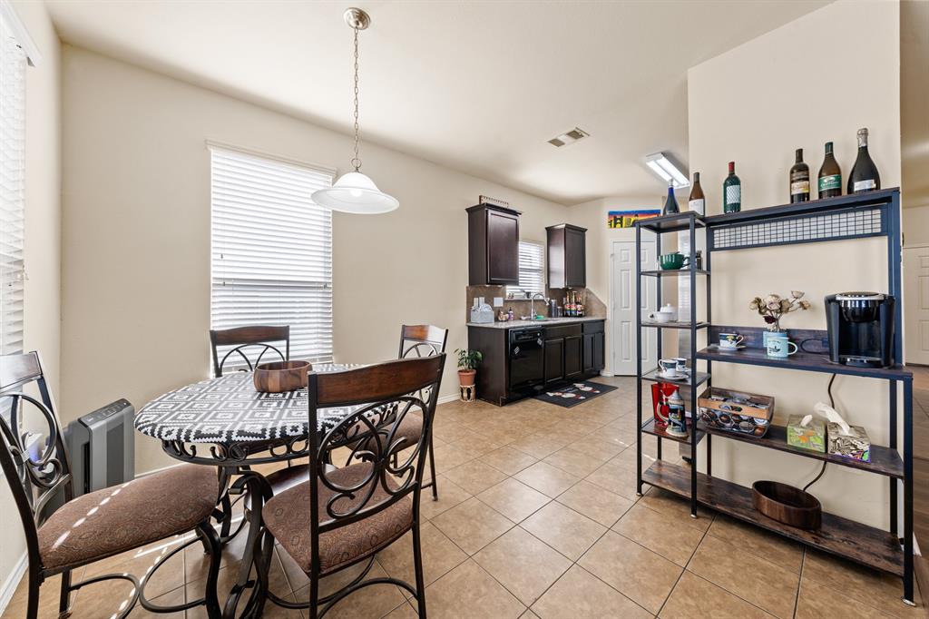 6544 Mundo Drive Waco, TX 76712 - Photo 5 of 21 a view of a dining room with furniture and a chandelier