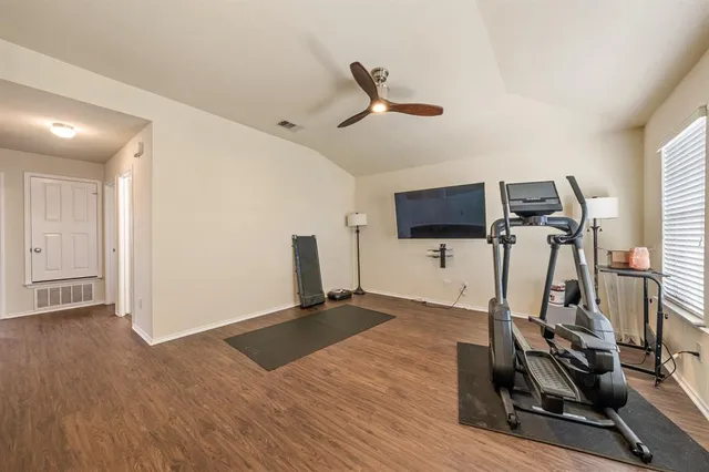 a view of a room with gym equipment