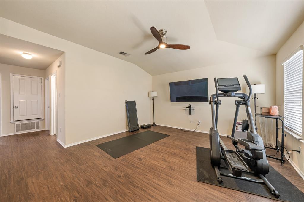 6544 Mundo Drive Waco, TX 76712 - Photo 9 of 21 a view of a room with gym equipment