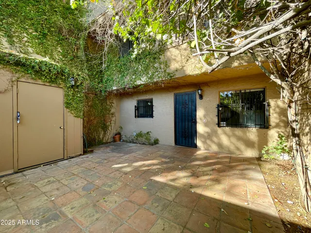 a view of a house with a snow in the yard