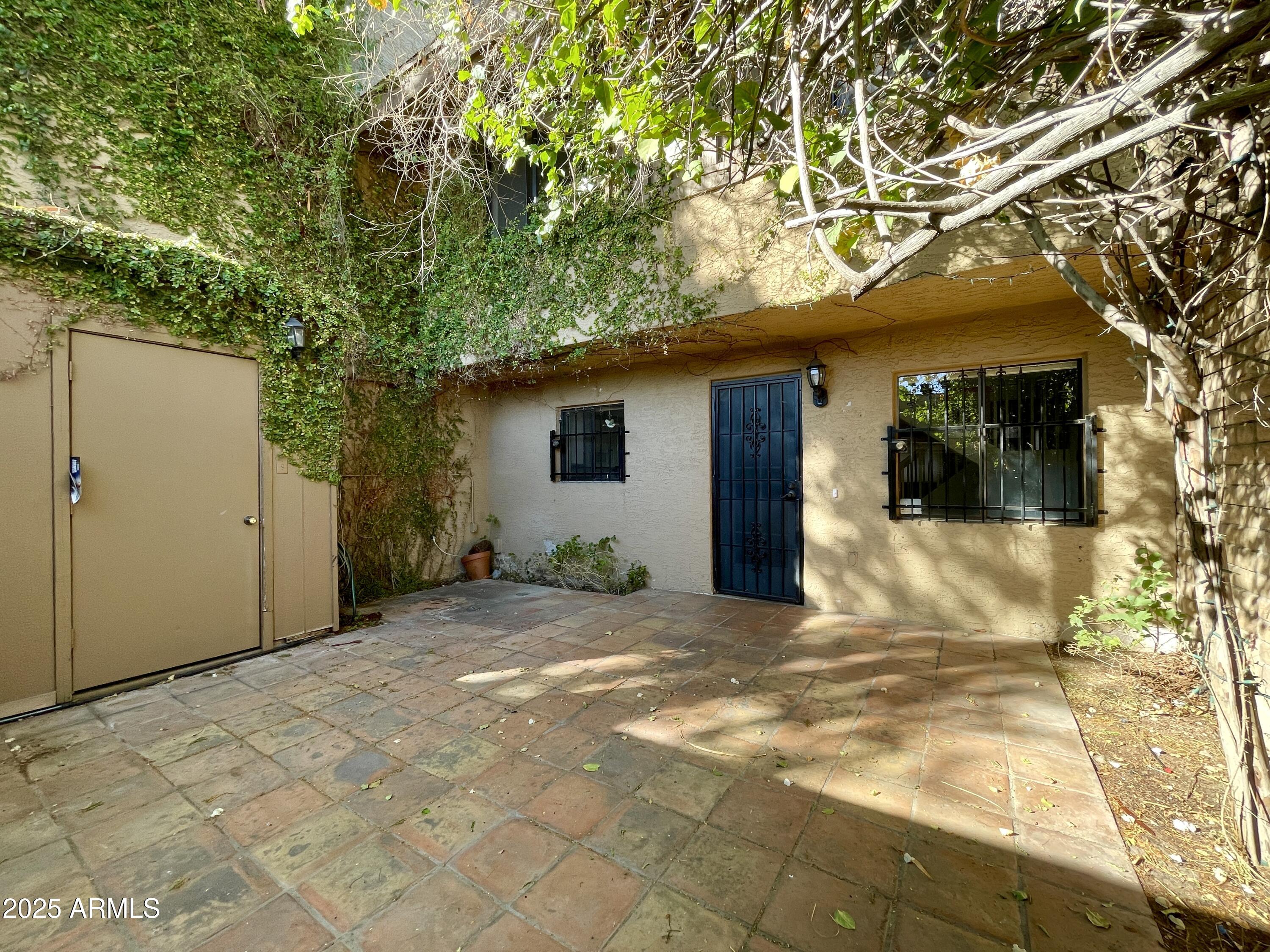 a view of a house with a snow in the yard