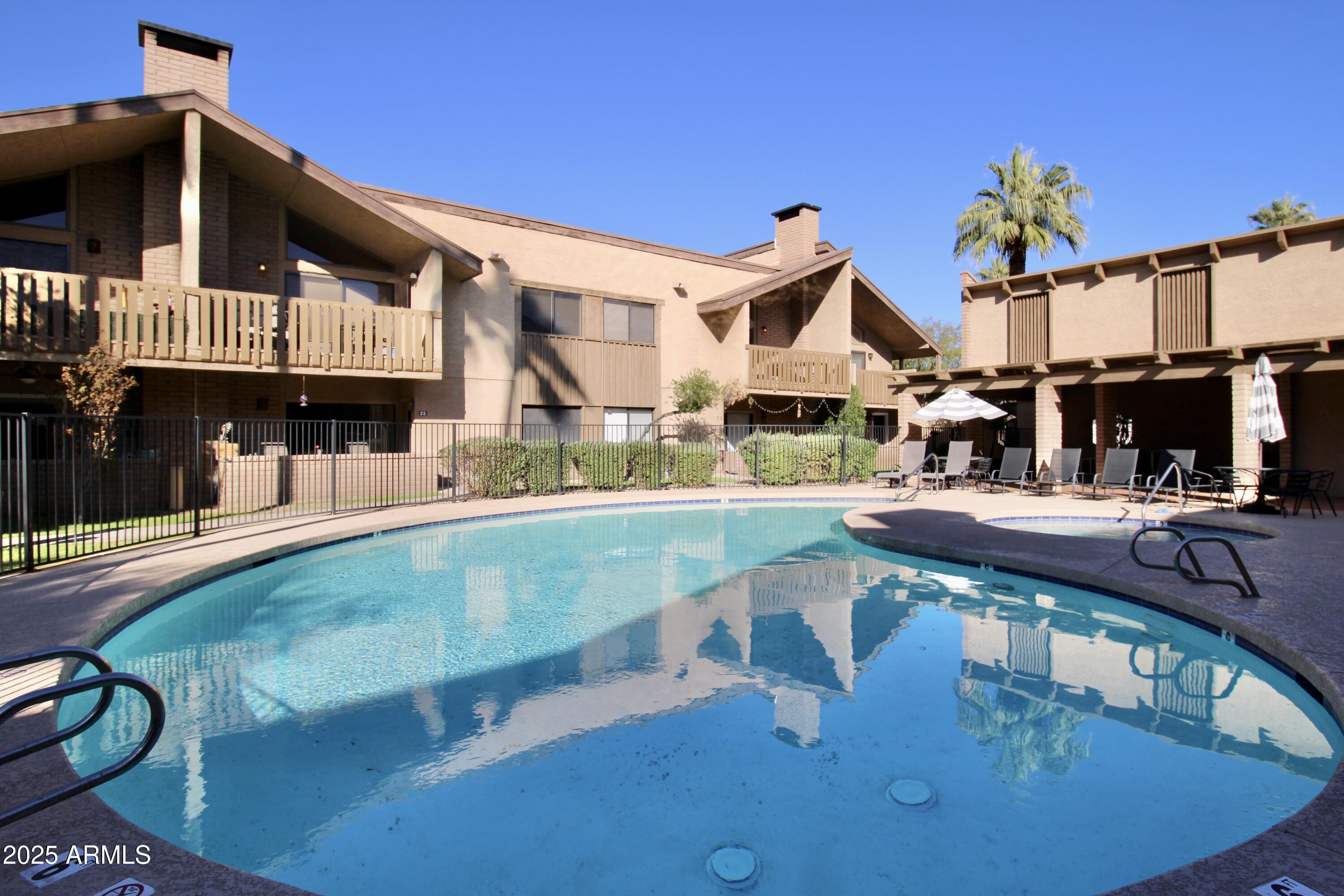 5330 North Central Avenue, Unit 19 Phoenix, AZ 85012 - Photo 27 of 33 a view of a house with swimming pool