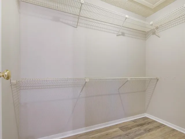 a view of a room with racks on the wall