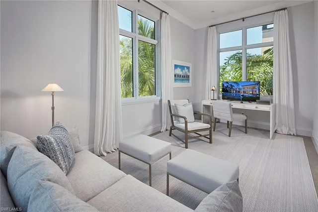 a bathroom with double sink and a toilet