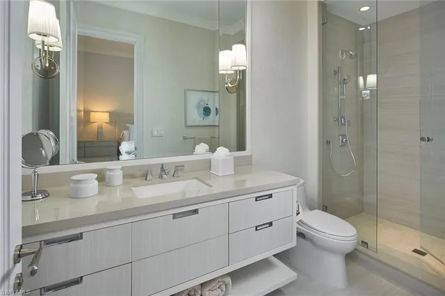 a bedroom with a bed and a cabinets