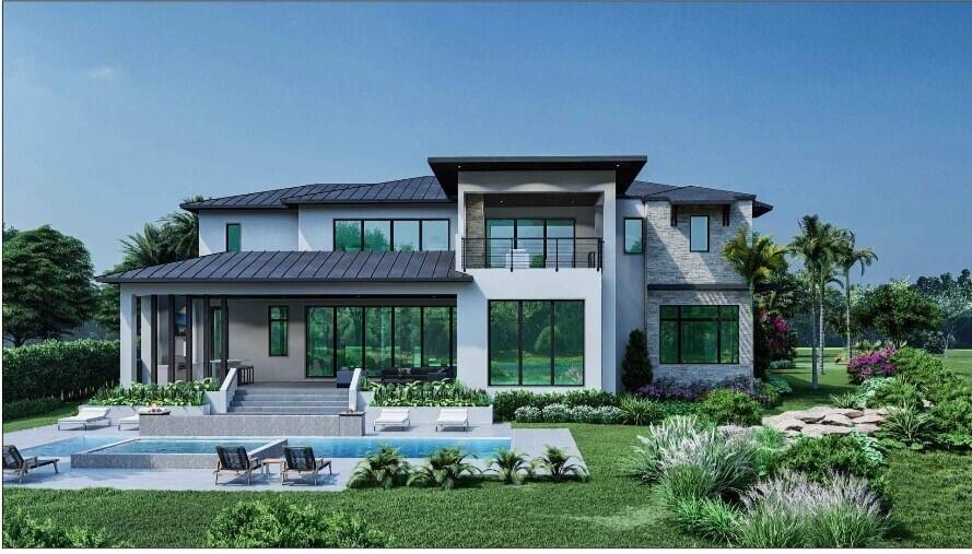 4 Whitney Way Ocean Ridge, FL 33435 - Photo 2 of 12 front view of a house with a yard