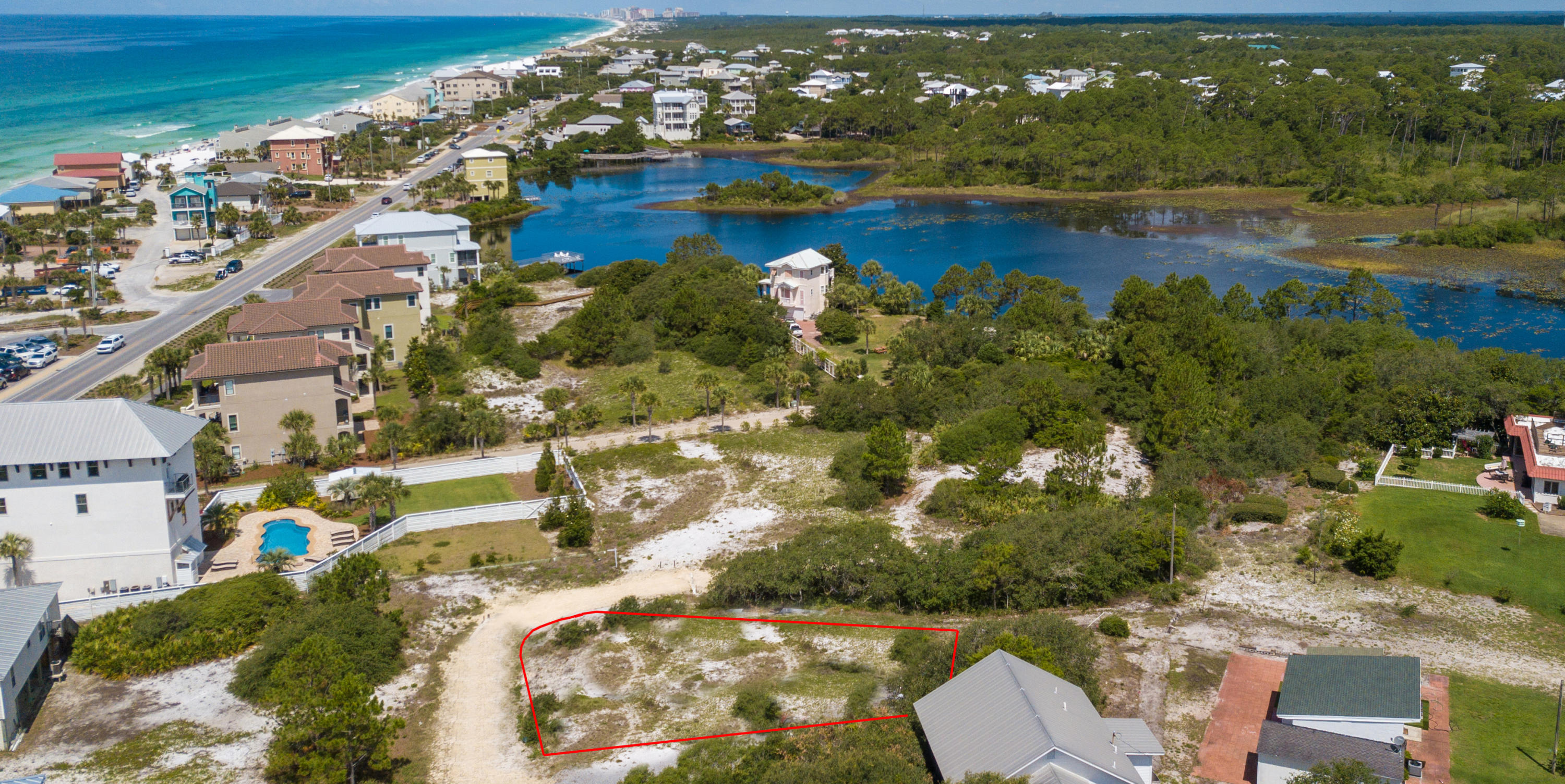 70 West Seahorse Circle Santa Rosa Beach, FL 32459 - Photo 2 of 25 a view of a lake with a city
