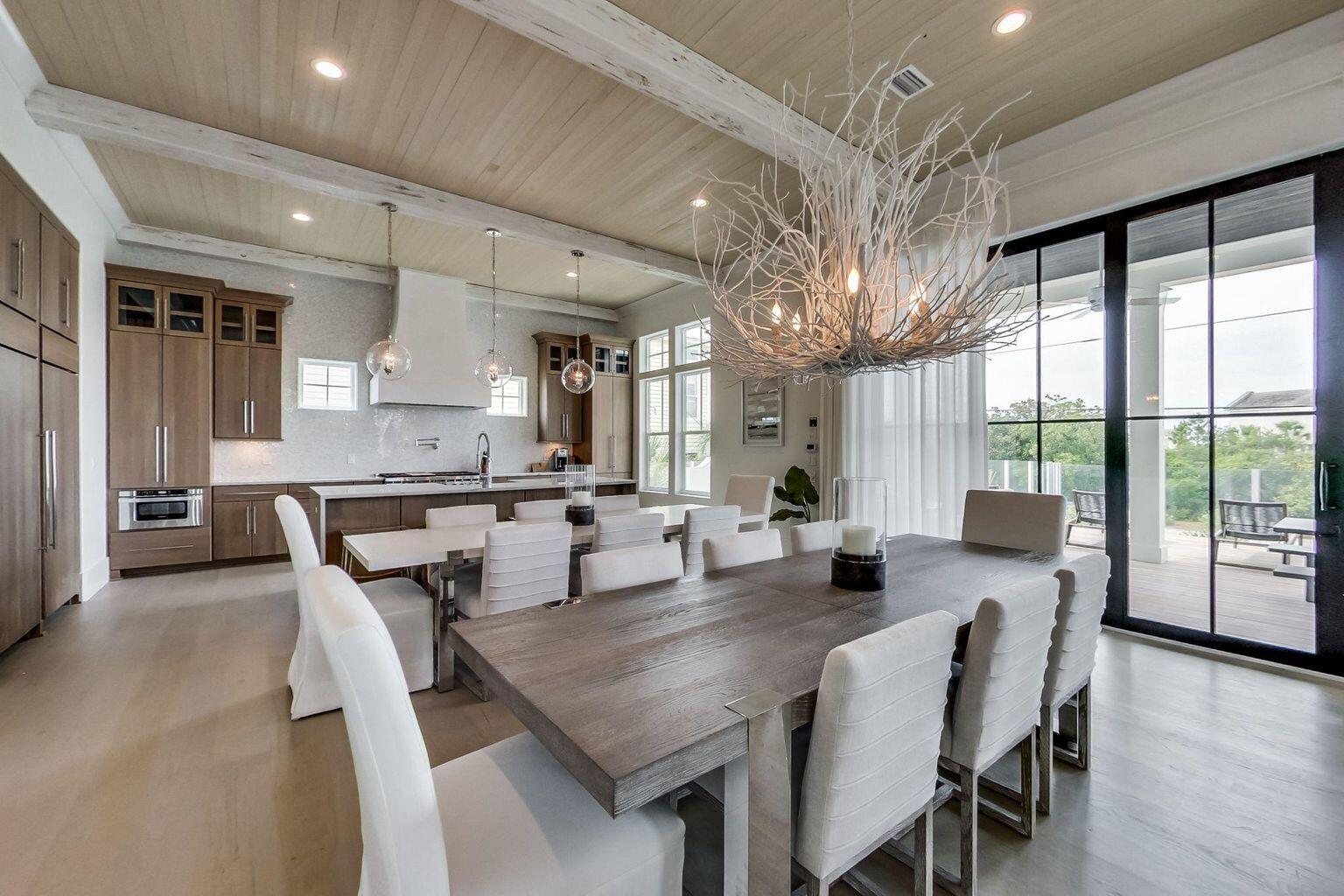 70 West Seahorse Circle Santa Rosa Beach, FL 32459 - Photo 17 of 25 a view of a dining room with furniture window and wooden floor