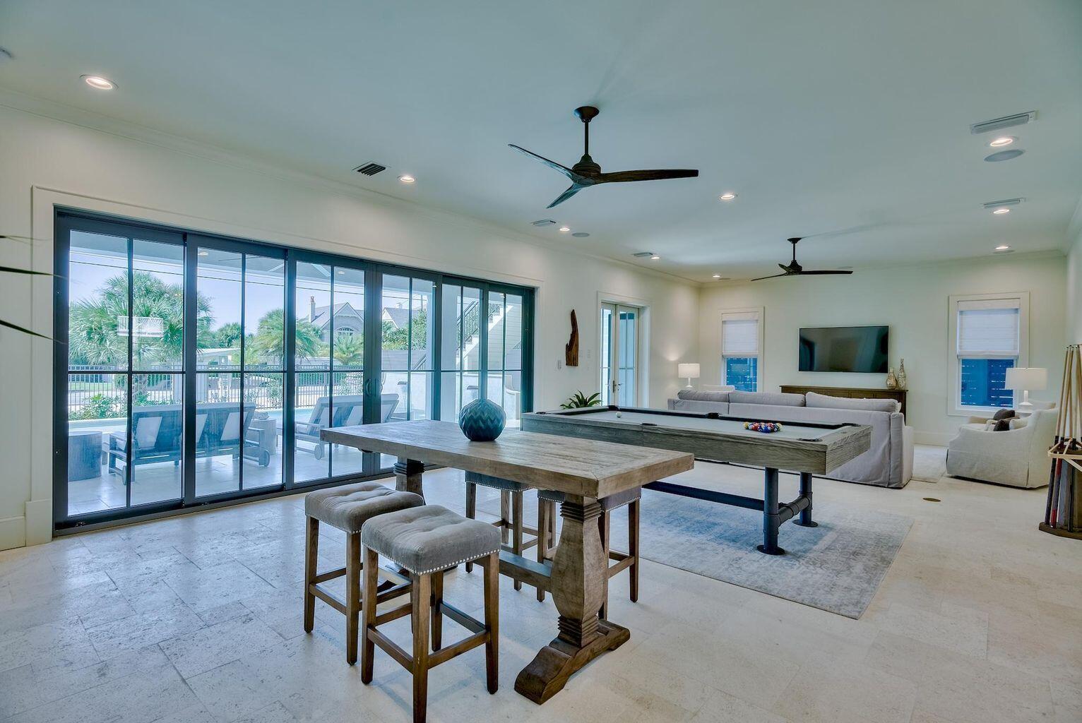 70 West Seahorse Circle Santa Rosa Beach, FL 32459 - Photo 21 of 25 a view of a livingroom with furniture and a rug