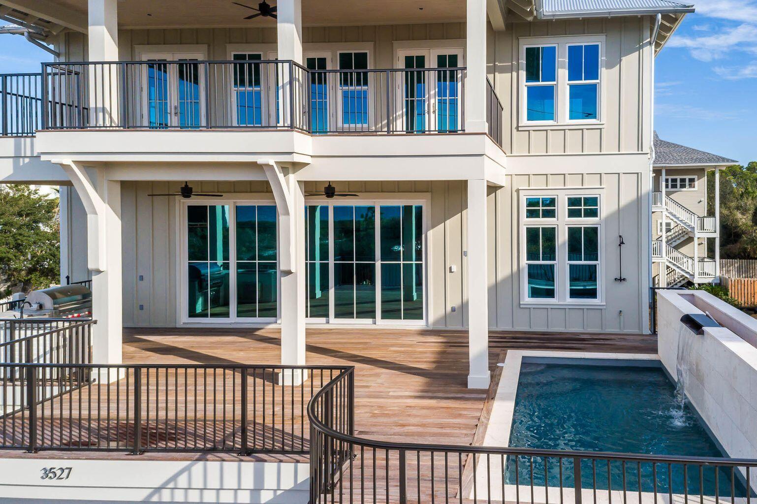 70 West Seahorse Circle Santa Rosa Beach, FL 32459 - Photo 24 of 25 a view of front door of house with stairs