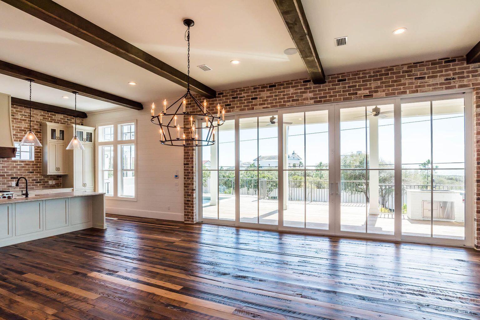 70 West Seahorse Circle Santa Rosa Beach, FL 32459 - Photo 25 of 25 a view of an empty room with wooden floor and a window