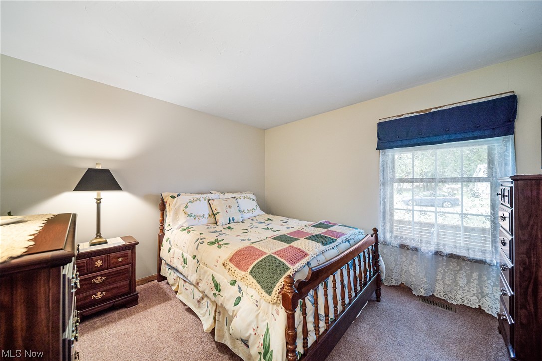 431 Ansel Road Geneva, OH 44041 - Photo 26 of 35 View of carpeted bedroom