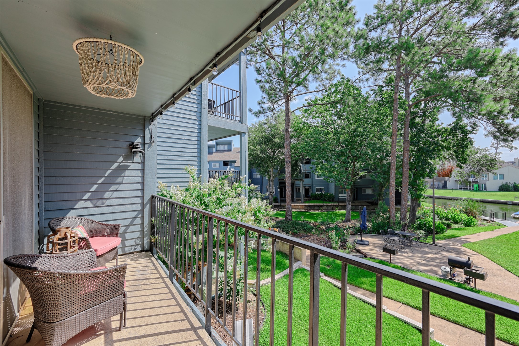 12500 Melville Drive, Unit 123C Montgomery, TX 77356 - Photo 25 of 31 a view of a porch with furniture
