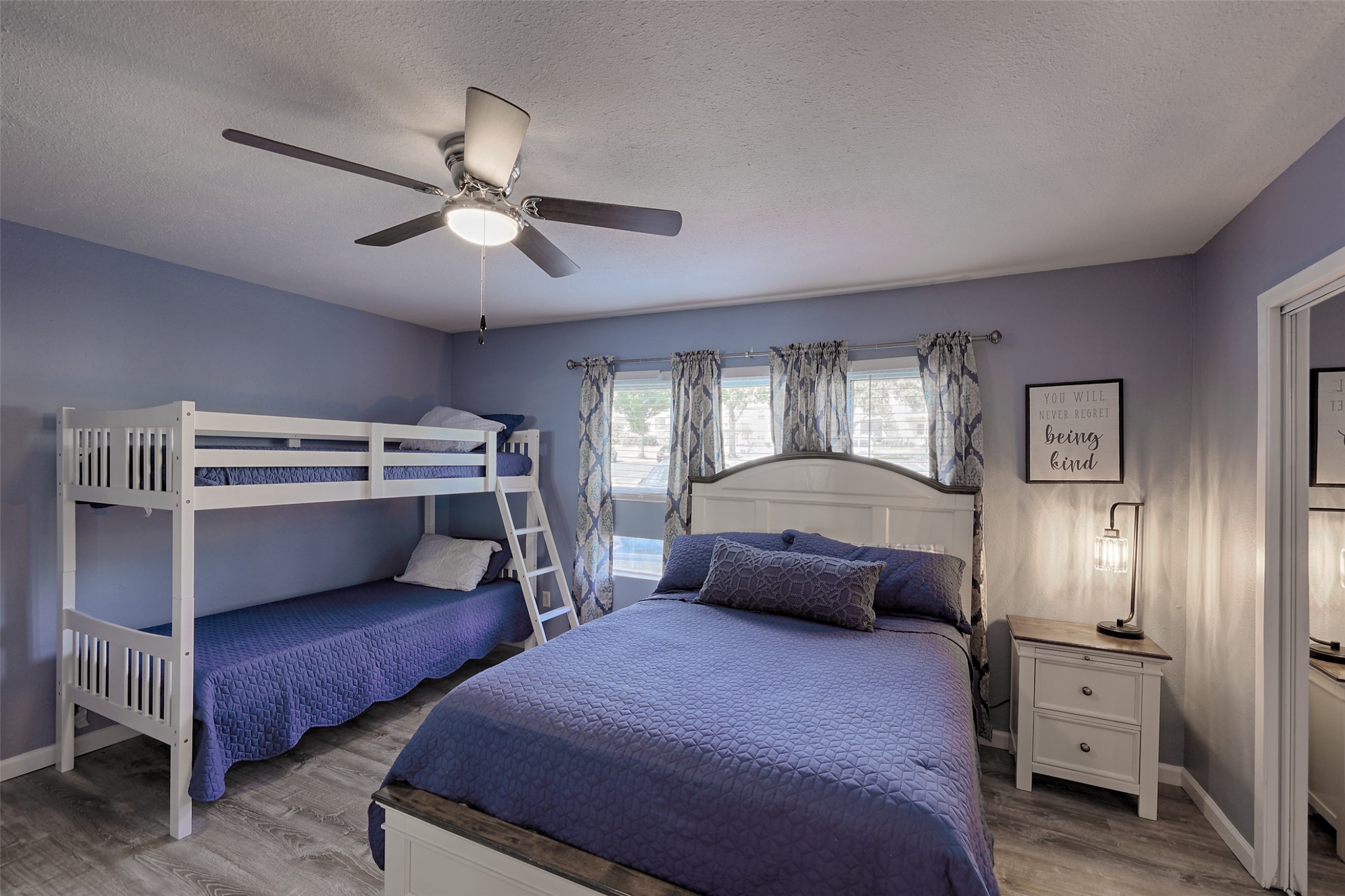 12500 Melville Drive, Unit 123C Montgomery, TX 77356 - Photo 10 of 31 a bedroom with bed and window