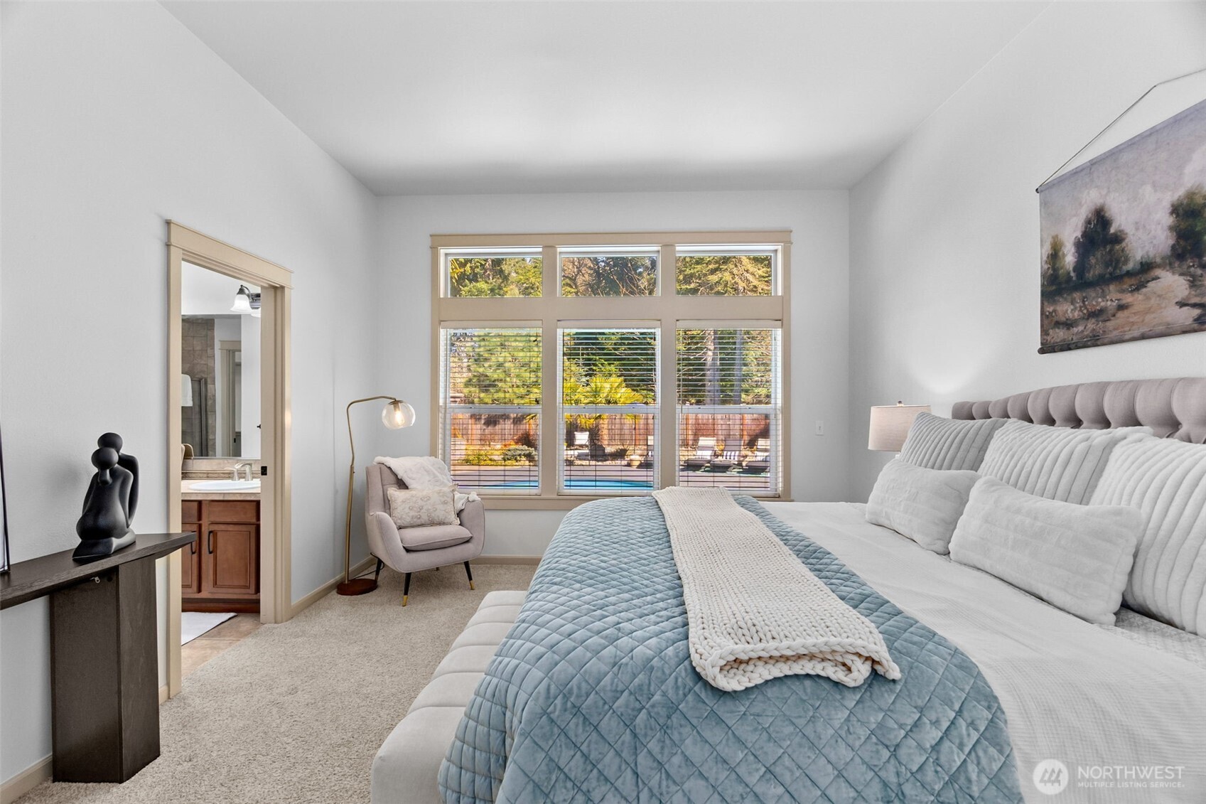 4244 90th Way Southeast Olympia, WA 98501 - Photo 17 of 40 a bed room with a bed and a large window