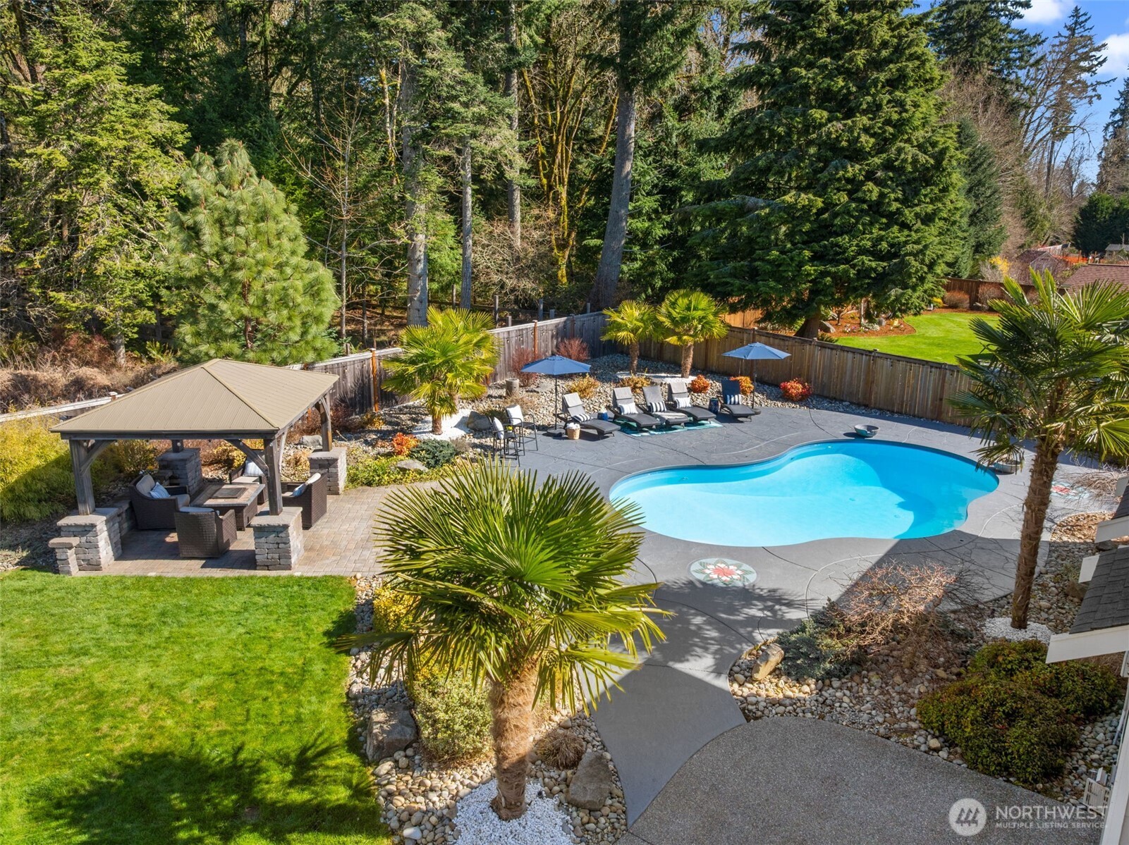 4244 90th Way Southeast Olympia, WA 98501 - Photo 32 of 40 an outdoor space with furniture and garden