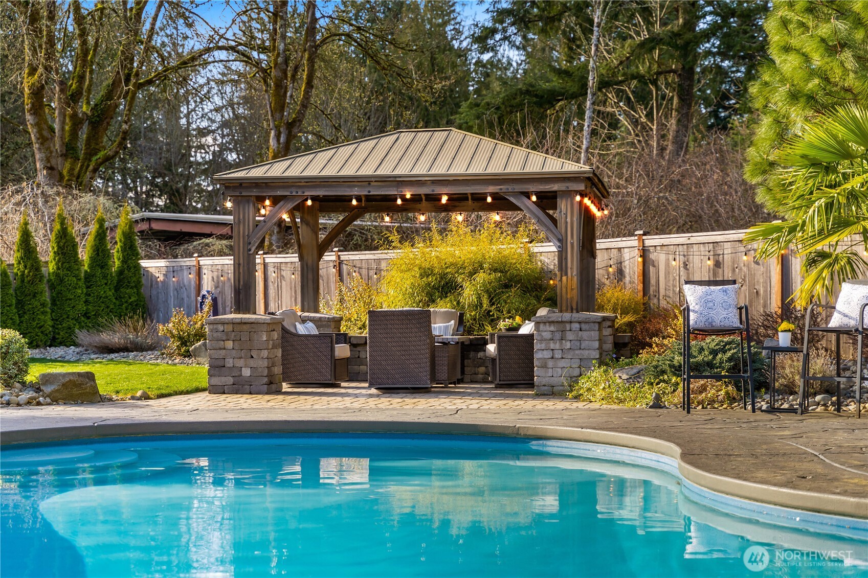 4244 90th Way Southeast Olympia, WA 98501 - Photo 33 of 40 a view of swimming pool with a patio