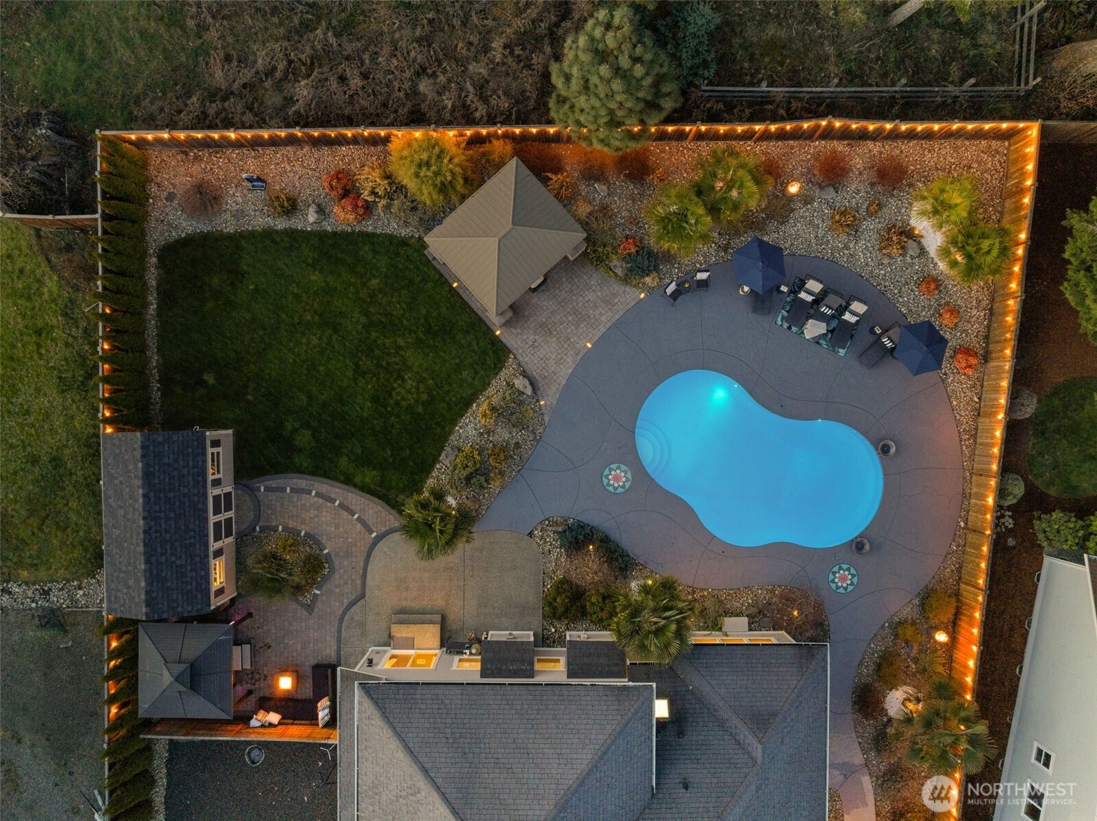 4244 90th Way Southeast Olympia, WA 98501 - Photo 37 of 40 an aerial view of a house with swimming pool and outdoor seating