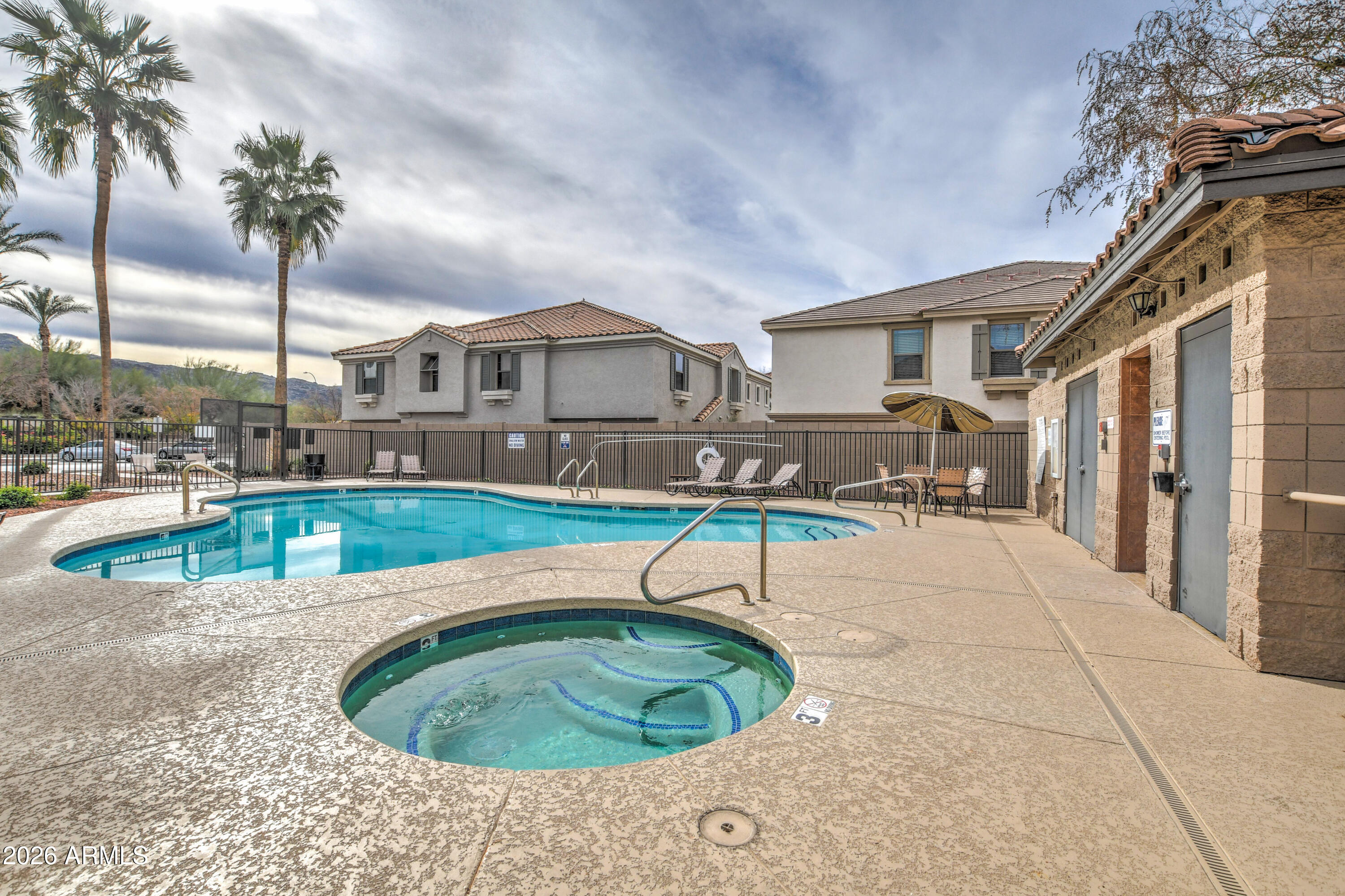 7515 South 30th Place Phoenix, AZ 85042 - Photo 19 of 23 a swimming pool with outdoor seating and yard