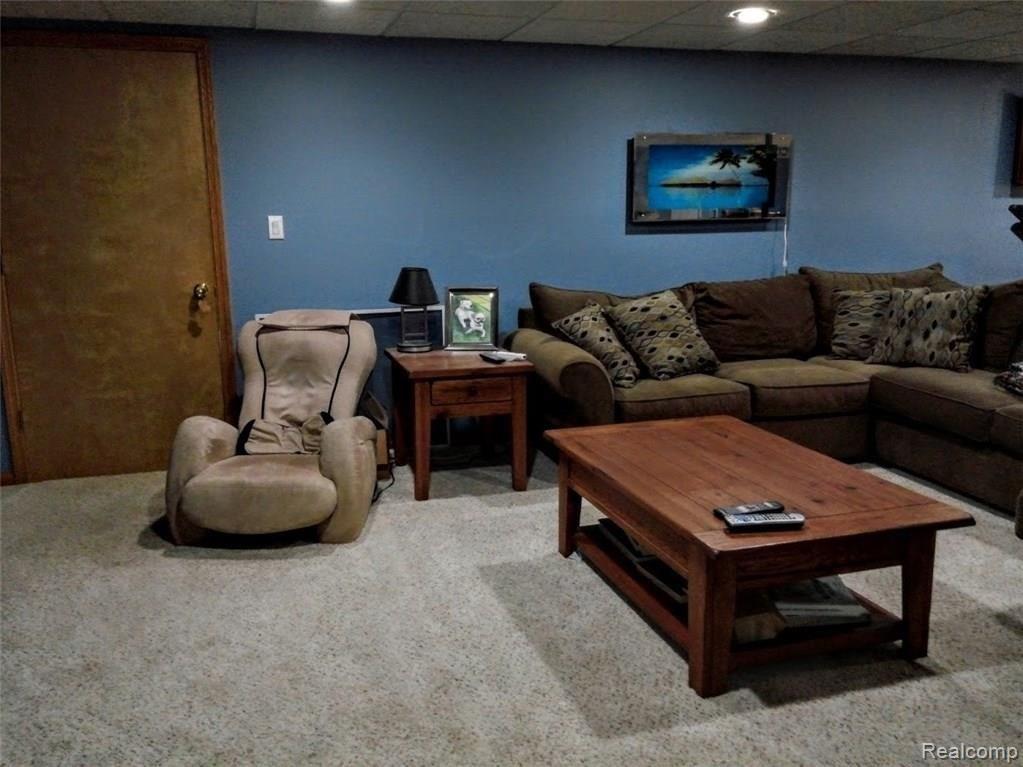 6878 Kestrel Ridge Road Brighton, MI 48116 - Photo 21 of 28 Family room in finished bsmt 1
