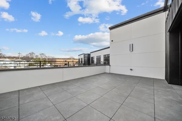 a view of a building and a terrace
