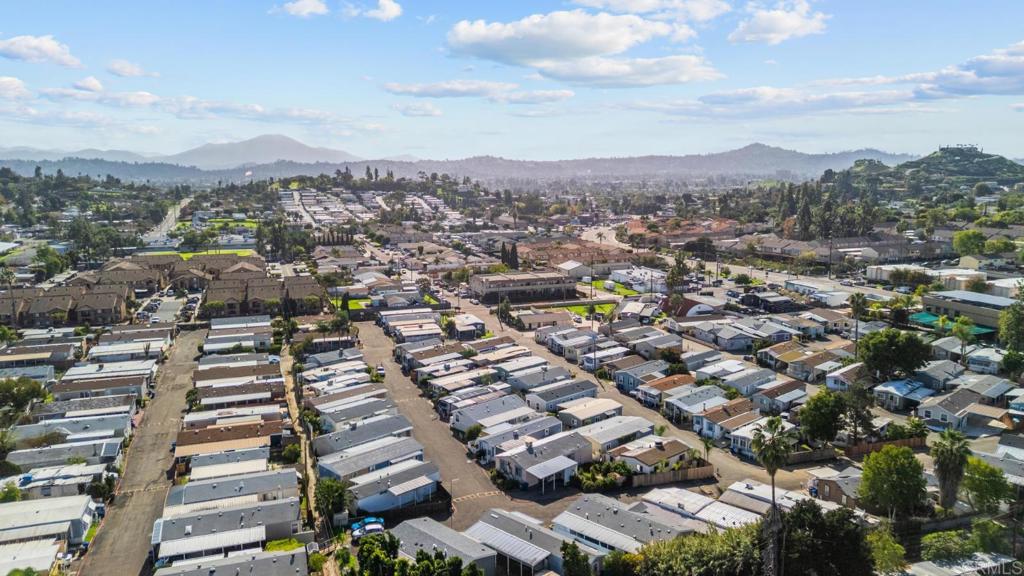 12044 Royal Road, Unit SPC 18 El Cajon, CA 92021 - Photo 19 of 24 an aerial view of city with green space