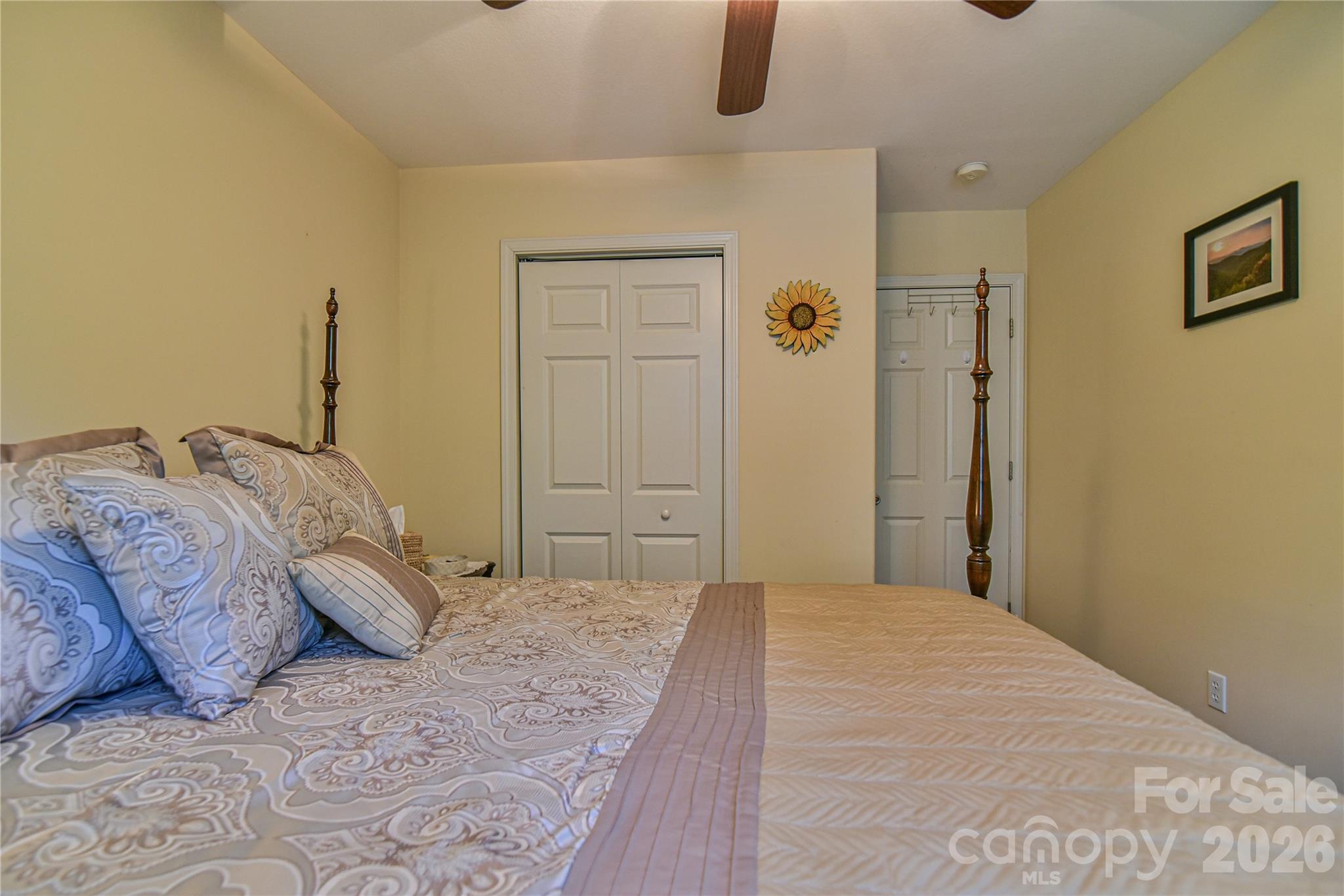 911 Fanning Bridge Road Fletcher, NC 28732 - Photo 14 of 28 a bedroom with a bed and closet