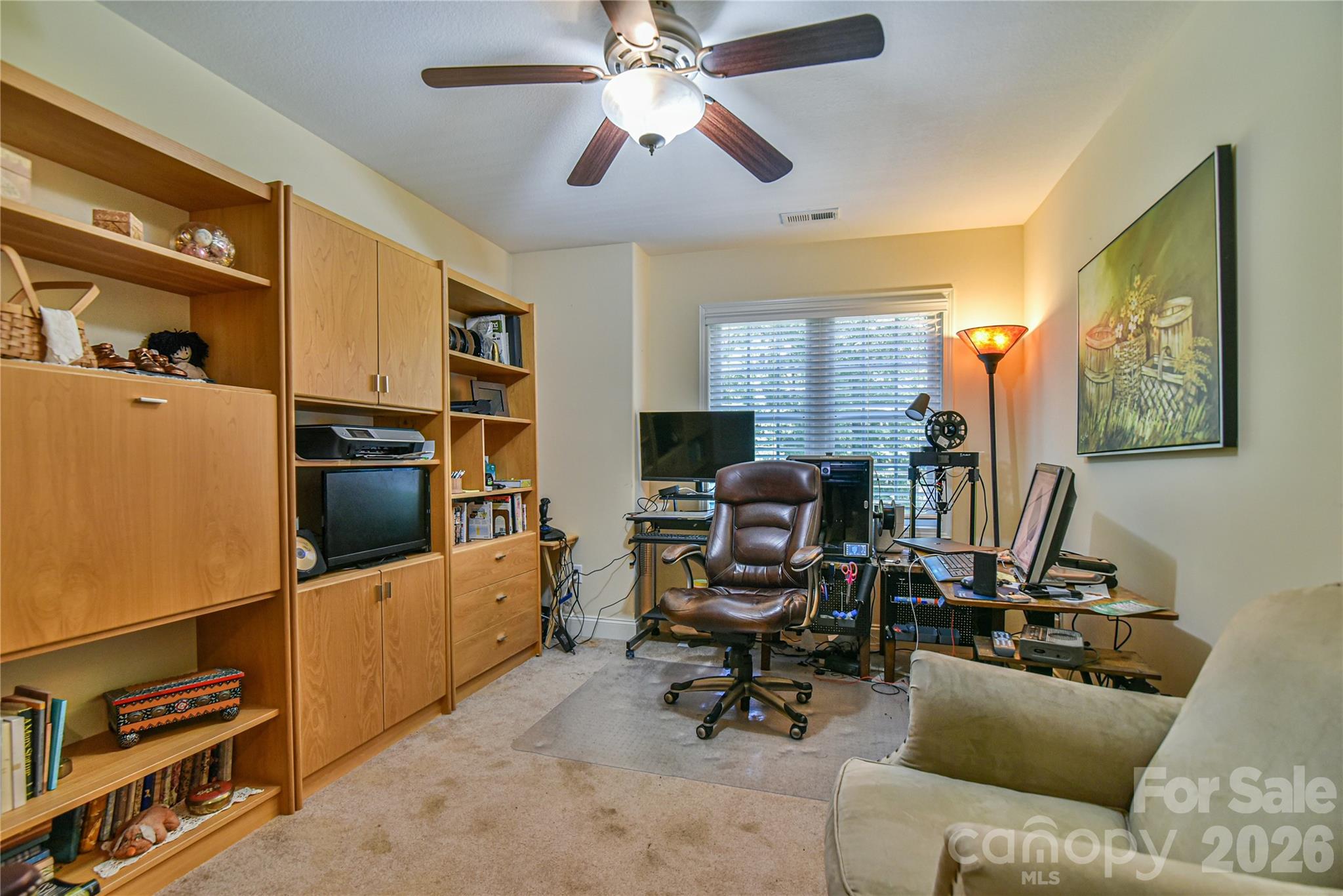 911 Fanning Bridge Road Fletcher, NC 28732 - Photo 16 of 28 a view of a livingroom with workspace and a window