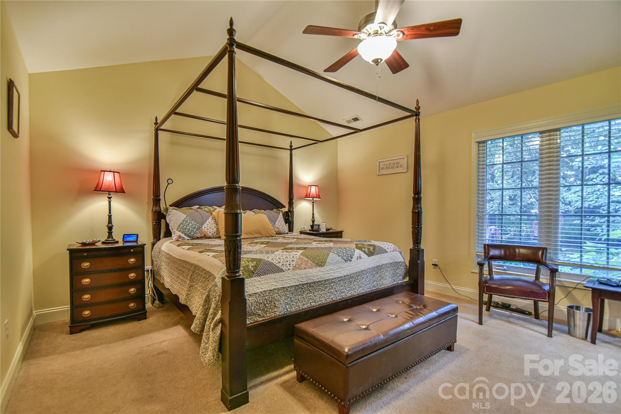 911 Fanning Bridge Road Fletcher, NC 28732 - Photo 18 of 28 a bedroom with a bed window and a ceiling fan