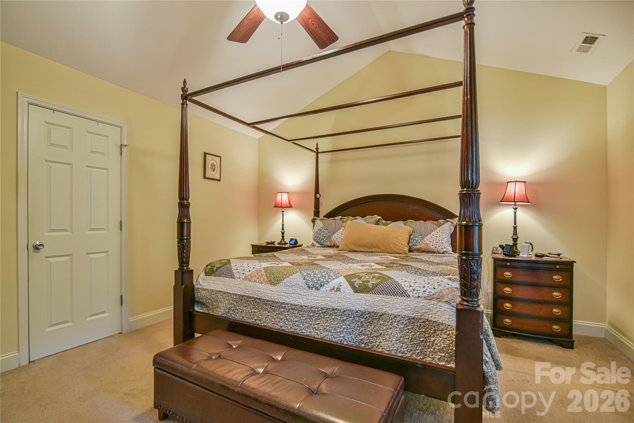 911 Fanning Bridge Road Fletcher, NC 28732 - Photo 19 of 28 a bedroom with a bed and a dresser