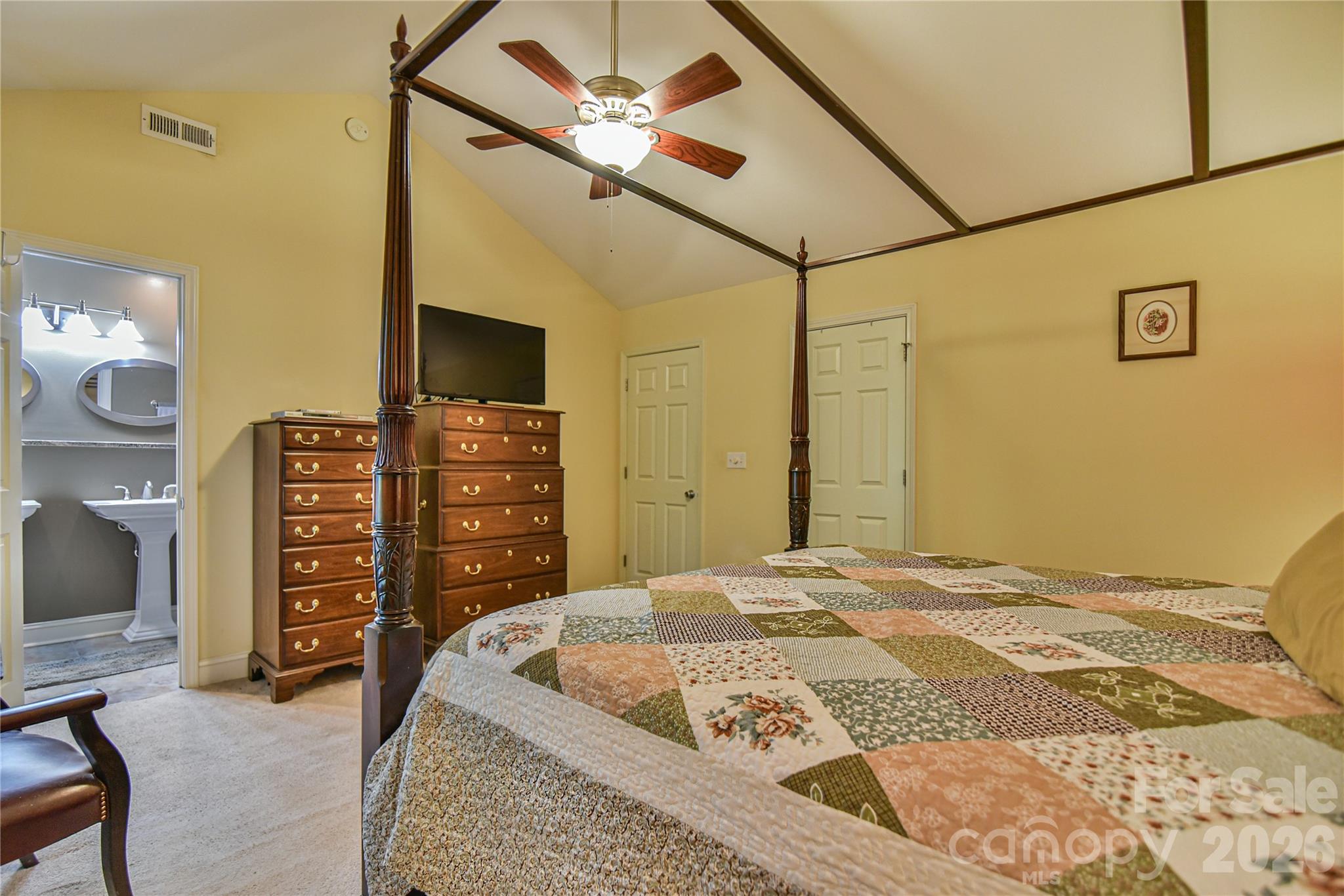 911 Fanning Bridge Road Fletcher, NC 28732 - Photo 20 of 28 a bedroom with a bed and a walk in closet