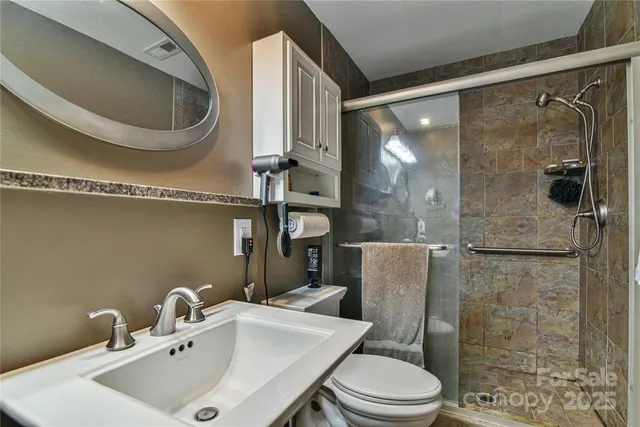 a room with furniture and a flat screen tv