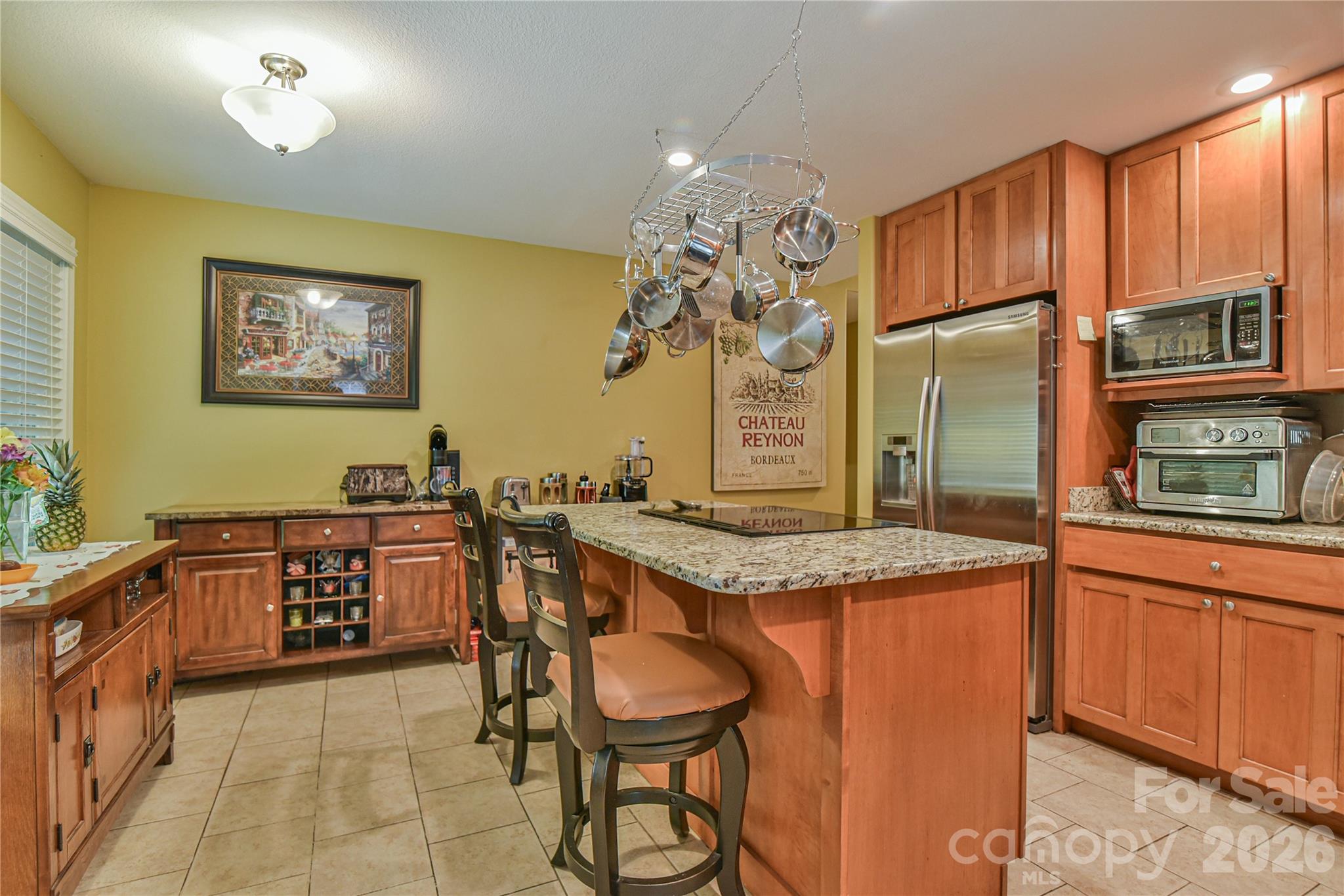 911 Fanning Bridge Road Fletcher, NC 28732 - Photo 10 of 28 a spacious bathroom with a granite countertop sink a mirror and a bathtub