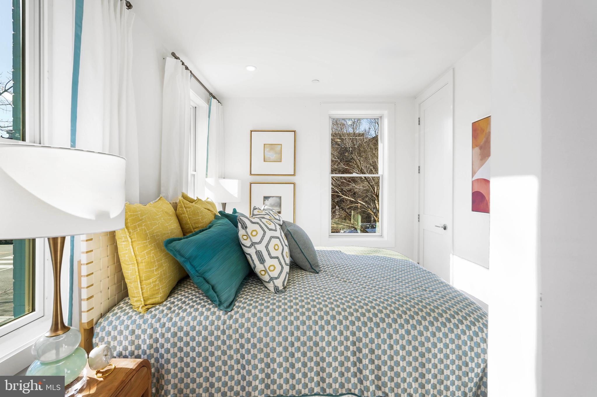 1237 W Street Northwest, Unit A Washington, DC 20009 - Photo 15 of 25 a bedroom with furniture and a window