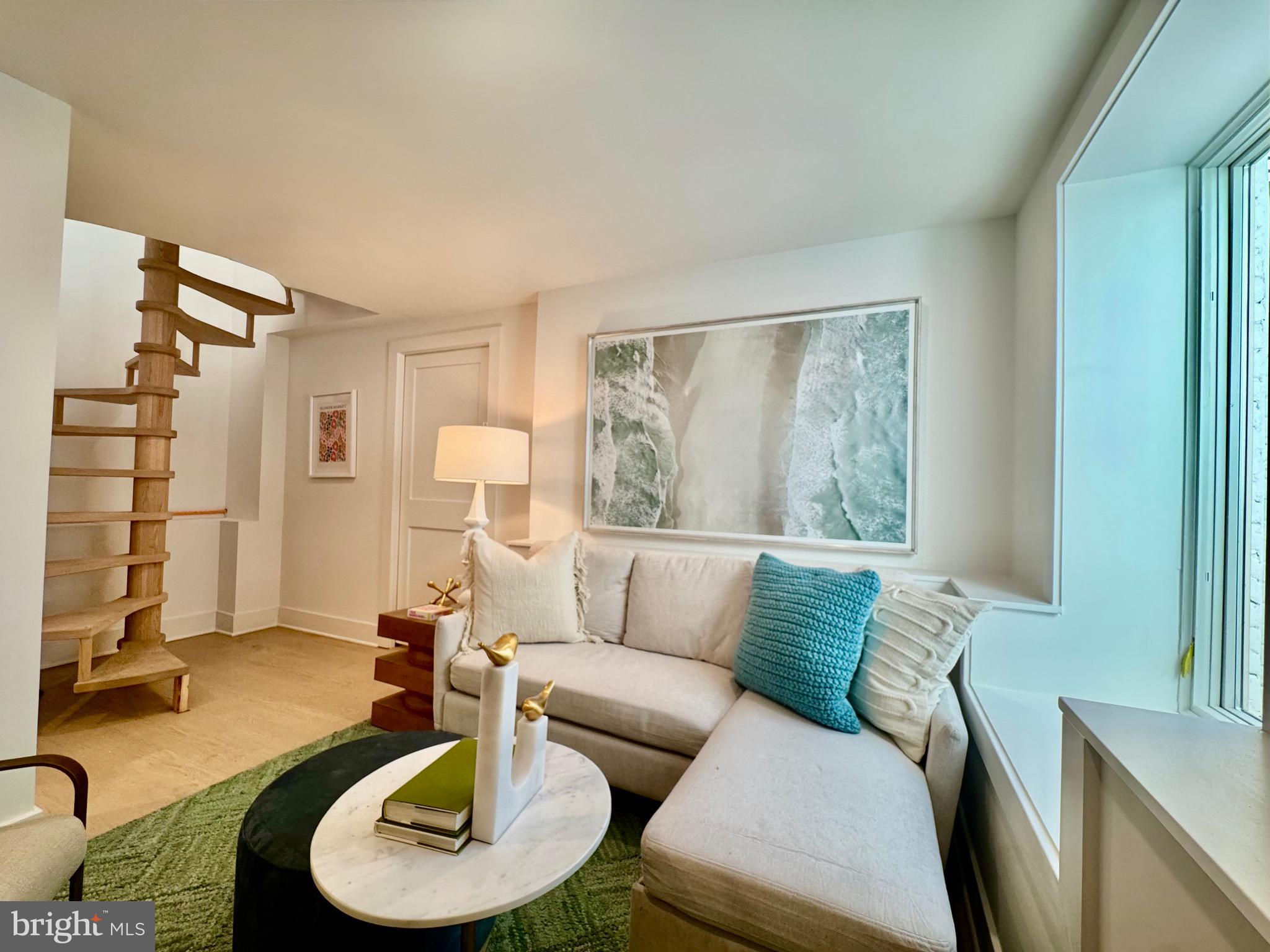 1237 W Street Northwest, Unit A Washington, DC 20009 - Photo 22 of 25 a living room with furniture and a fireplace