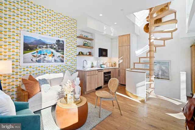 a living room with furniture and a table