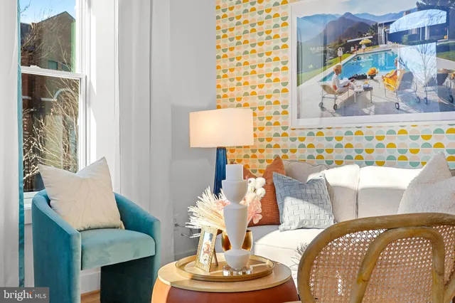 a living room with furniture and a table