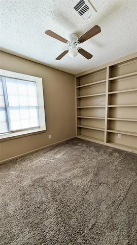 a view of room and a window