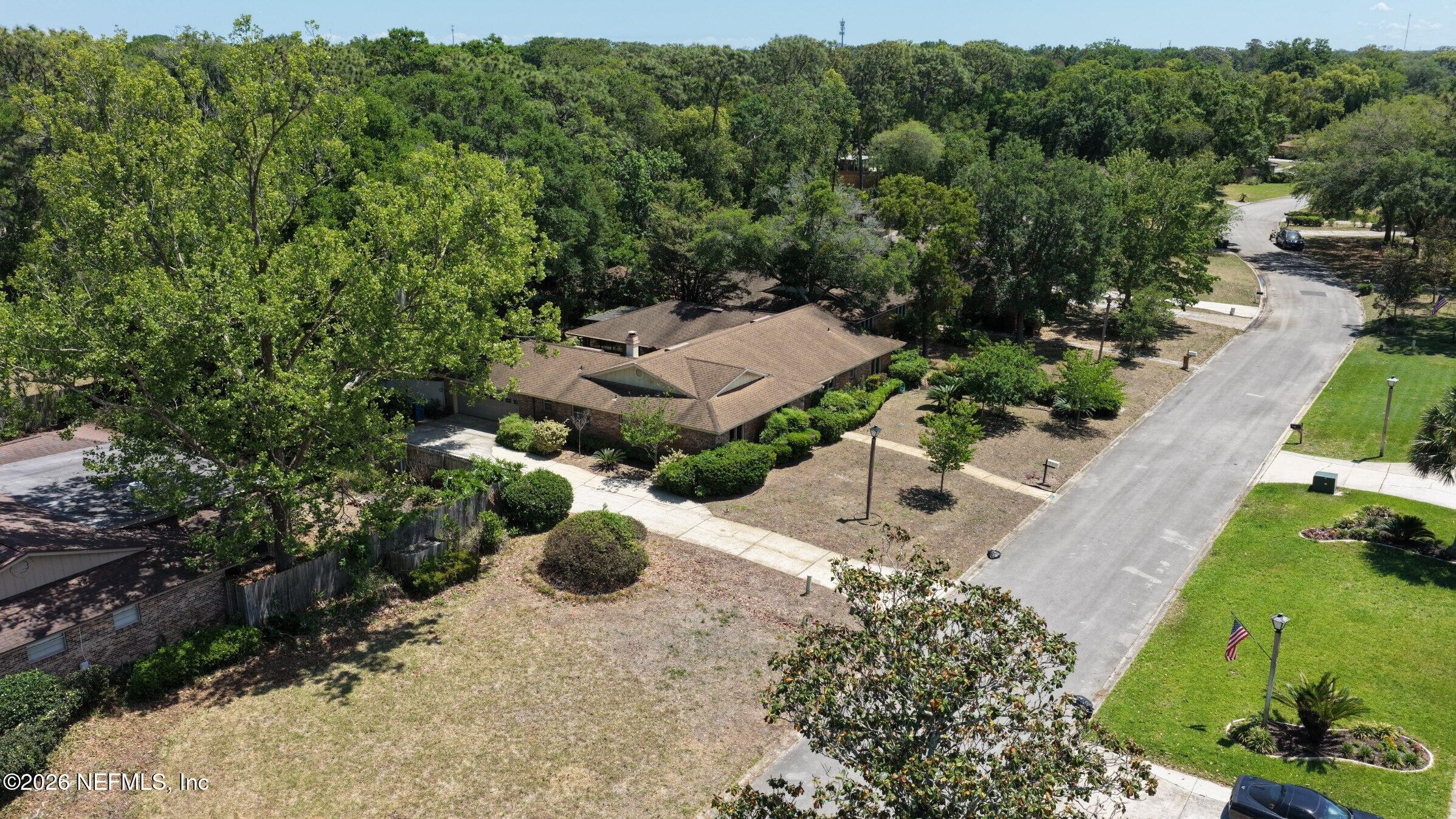 3371 Debussy Road Jacksonville, FL 32277 - Photo 6 of 21 DJI_20260423135913_0004_D