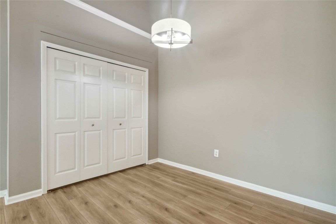 1601 Nectarine Street, Unit C5 Fernandina Beach, FL 32034 - Photo 10 of 25 a view of an empty room with wooden floor