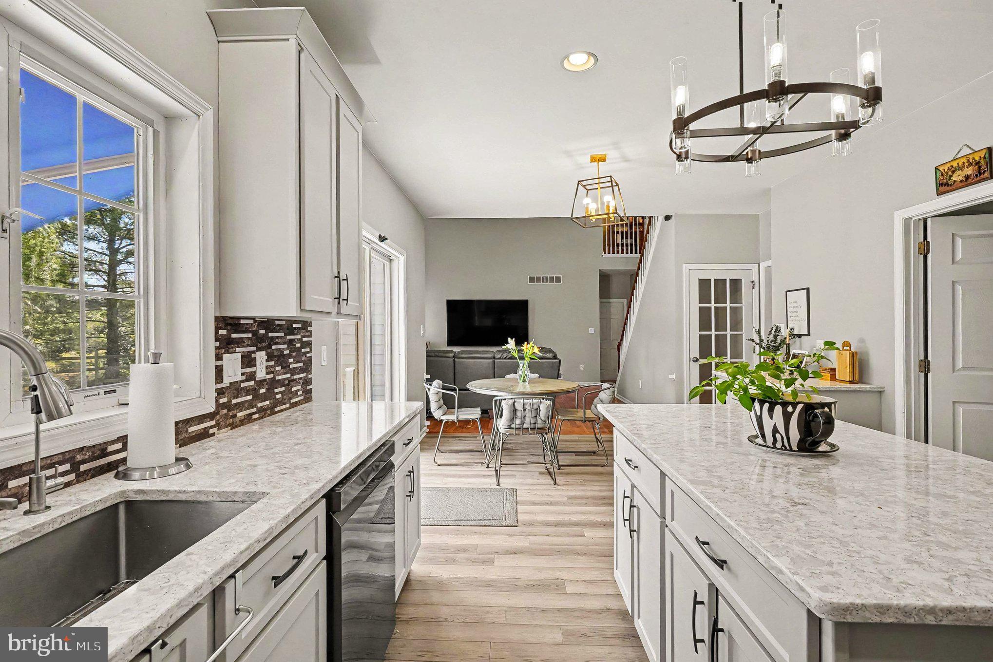 64 Open Meadow Court Elkton, MD 21921 - Photo 21 of 57 Striking Backsplash and Stainless Steel Appliances