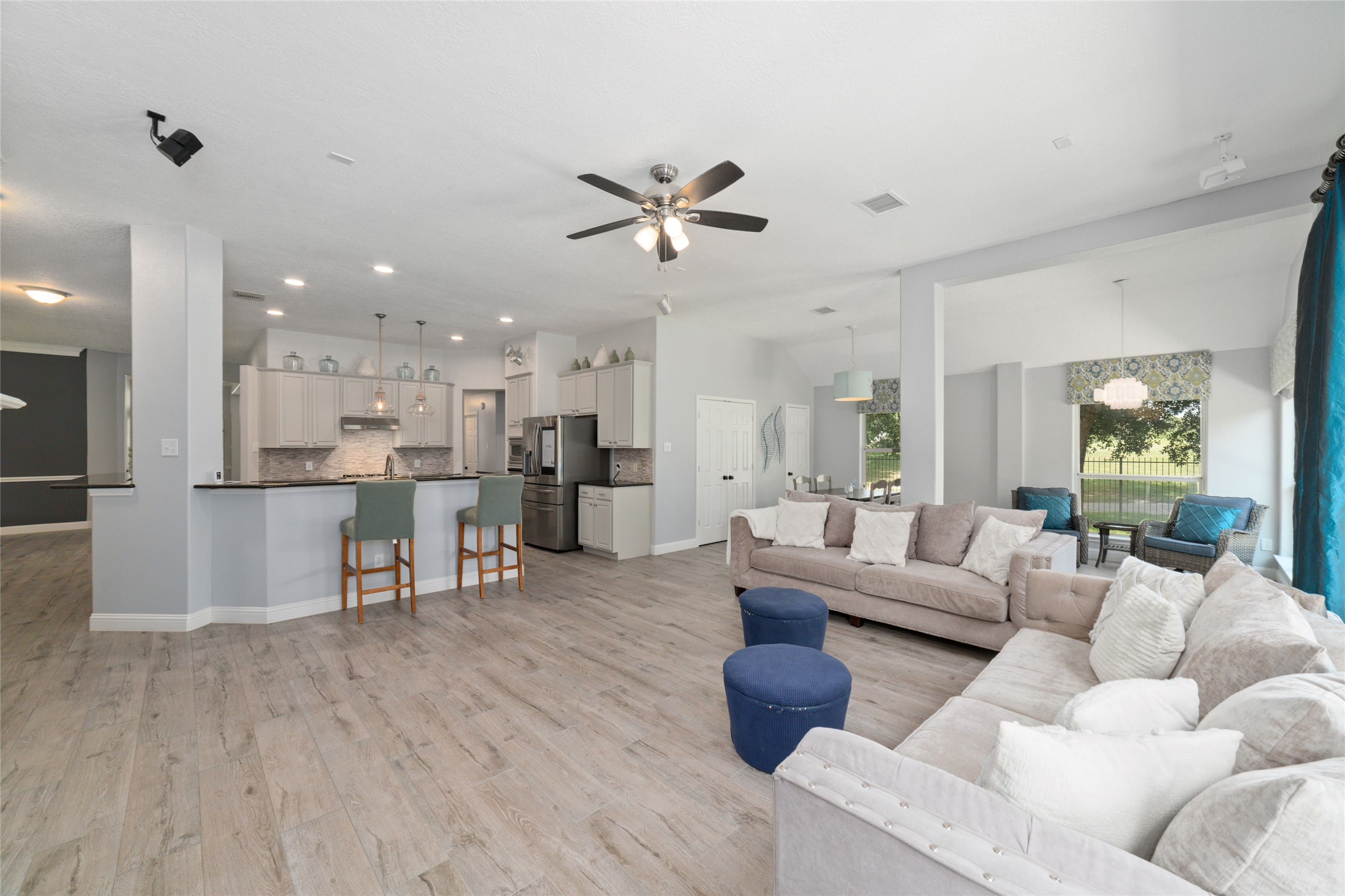 24203 Moon Ridge Court Katy, TX 77494 - Photo 20 of 43 Another view in the the living room to the kitchen.