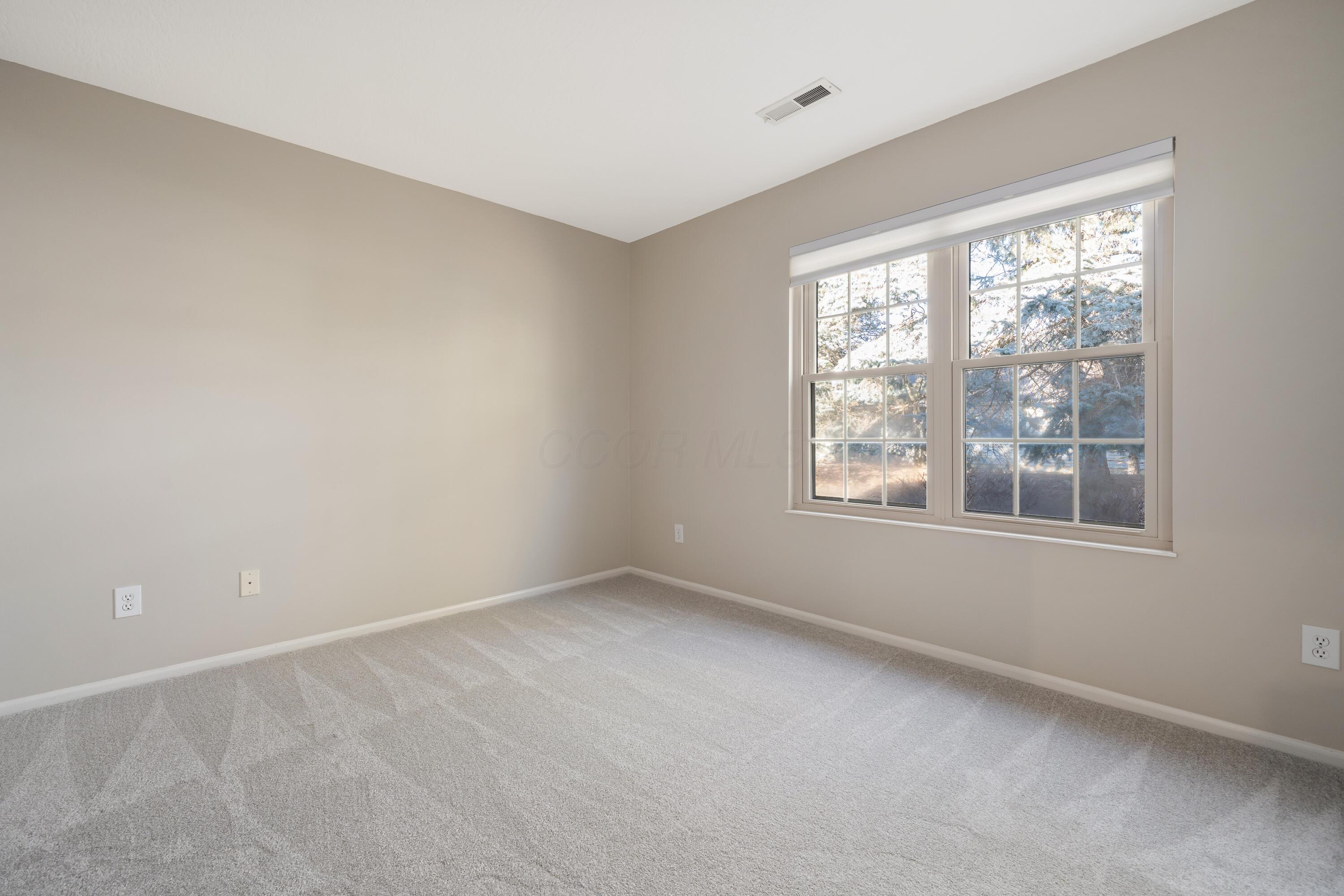 6770 Heatherstone Loop Dublin, OH 43017 - Photo 26 of 32 Bedroom 2 10'7" x 12'0" ( + - )