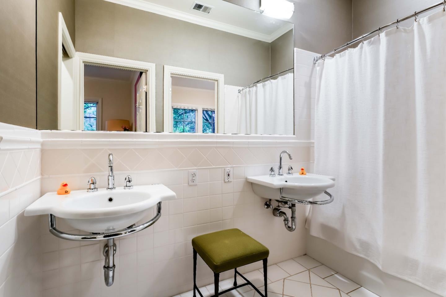 160 Phillip Road Woodside, CA 94062 - Photo 23 of 51 a bathroom with a sink and a mirror
