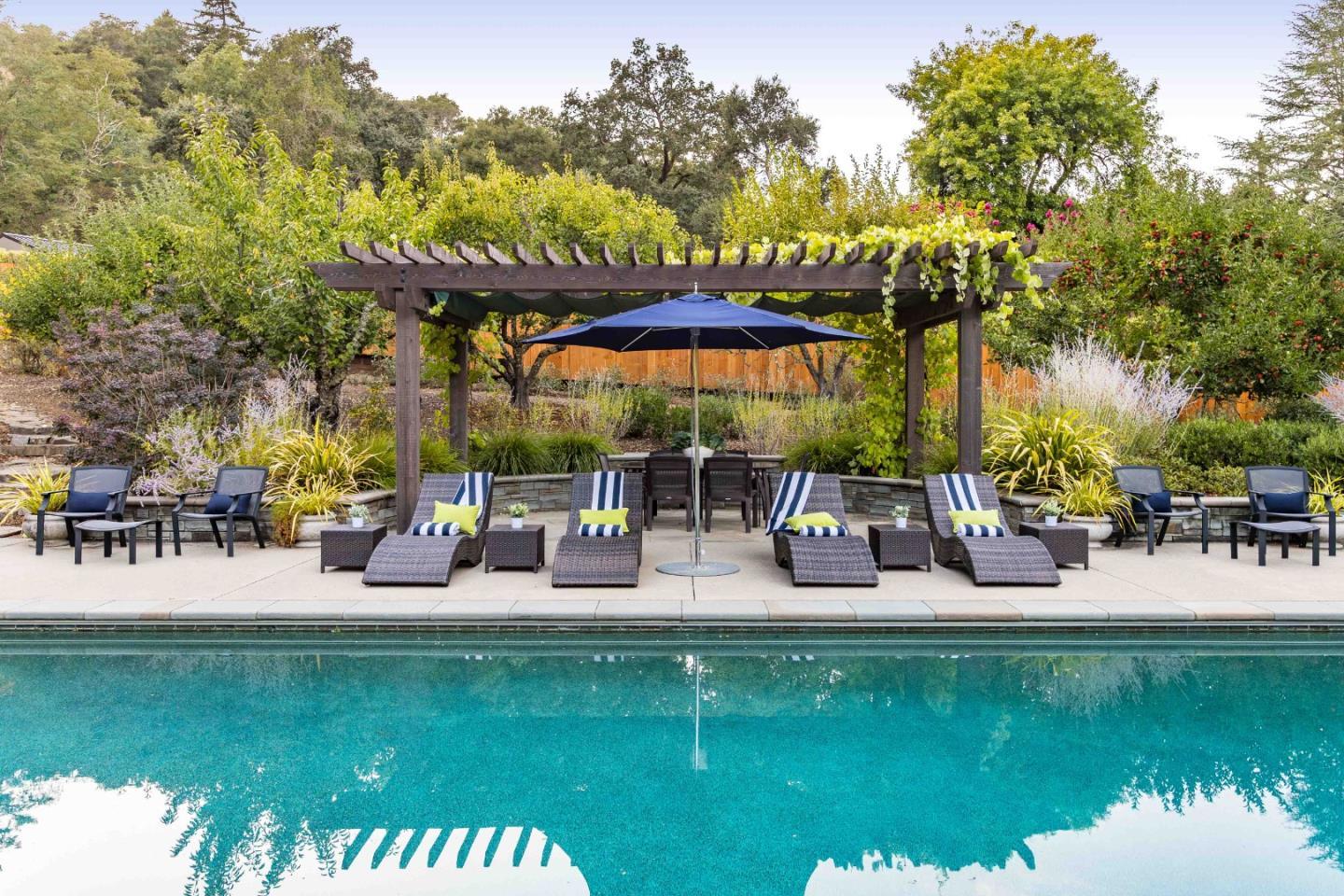 160 Phillip Road Woodside, CA 94062 - Photo 38 of 51 a view of a swimming pool with a patio