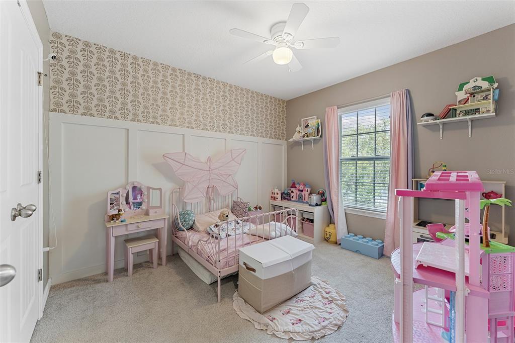 3523 Clay Brick Road St. Cloud, FL 34773 - Photo 21 of 62 a bedroom with furniture and a window