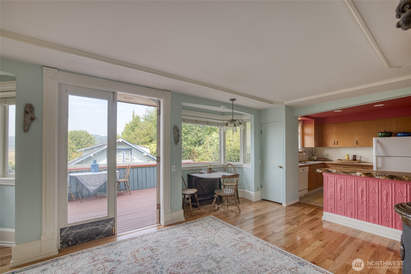209 Ferry Street South Bend, WA 98586 - Photo 13 of 39 a view of a kitchen with microwave and furniture