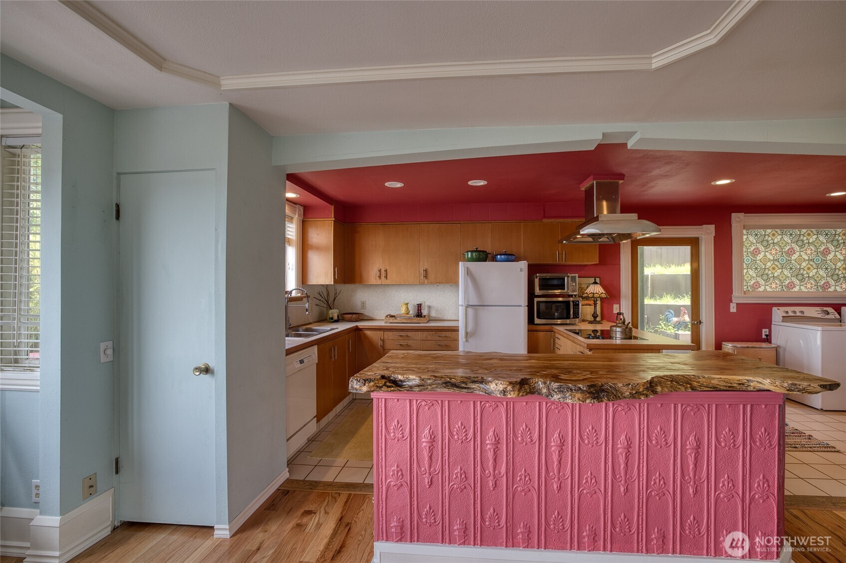 209 Ferry Street South Bend, WA 98586 - Photo 16 of 39 a kitchen with kitchen island granite countertop a sink cabinets and stainless steel appliances