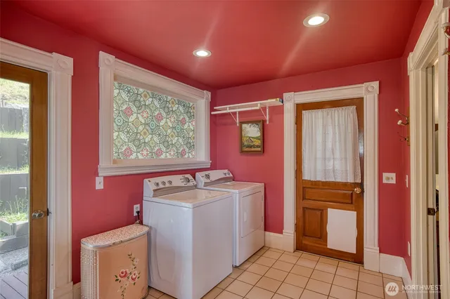 a spacious bathroom with a sink a toilet and a mirror